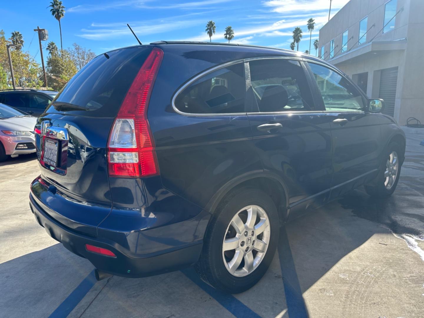 2007 Blue /Gray Honda CR-V EX 4WD AT (JHLRE48577C) with an 2.4L L4 DOHC 16V engine, 5-Speed Automatic Overdrive transmission, located at 30 S. Berkeley Avenue, Pasadena, CA, 91107, (626) 248-7567, 34.145447, -118.109398 - 4WD! This 2007 Honda CR-V EX 4WD looks and drives good. Don't let bad credit or financial setbacks hold you back from owning a dependable vehicle. At our BHPH dealership, we're here to make the car-buying process as smooth and stress-free as possible. We invite you to visit our dealership in Pasa - Photo#4